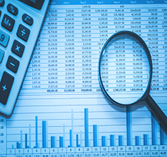 . Image - Financial data with calculator and magnifying glass. Click tile image to view